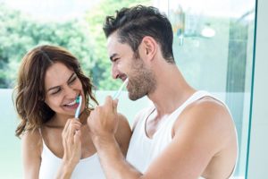 couple brushing teeth lippian family dentistry texarkana, tx